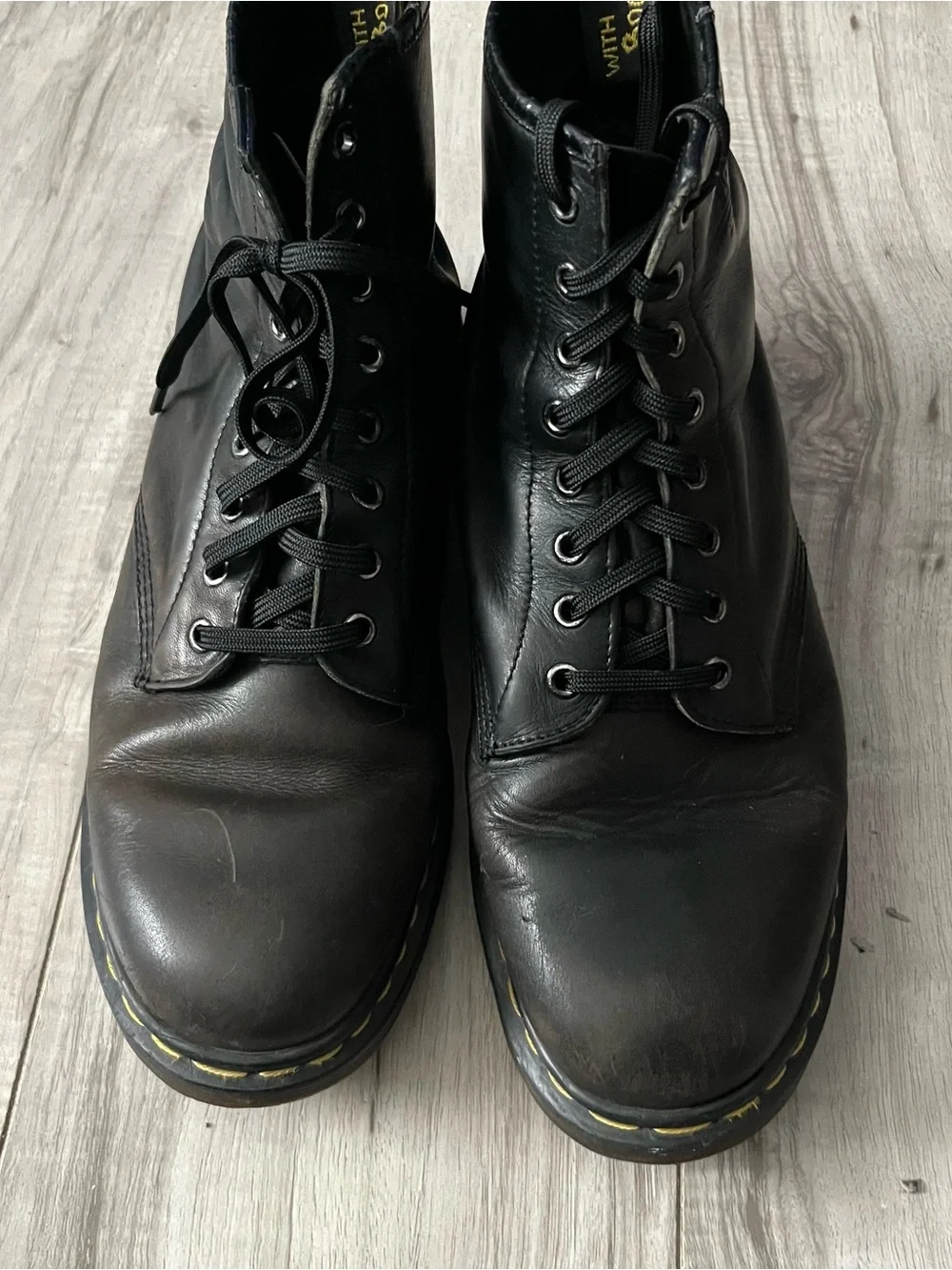 Dr. Martens Black Leather Lace-Up Combat Boots with Yellow Stitching